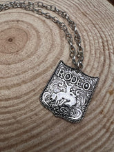 Load image into Gallery viewer, Silver Colored Western Rodeo Pendant Necklace

